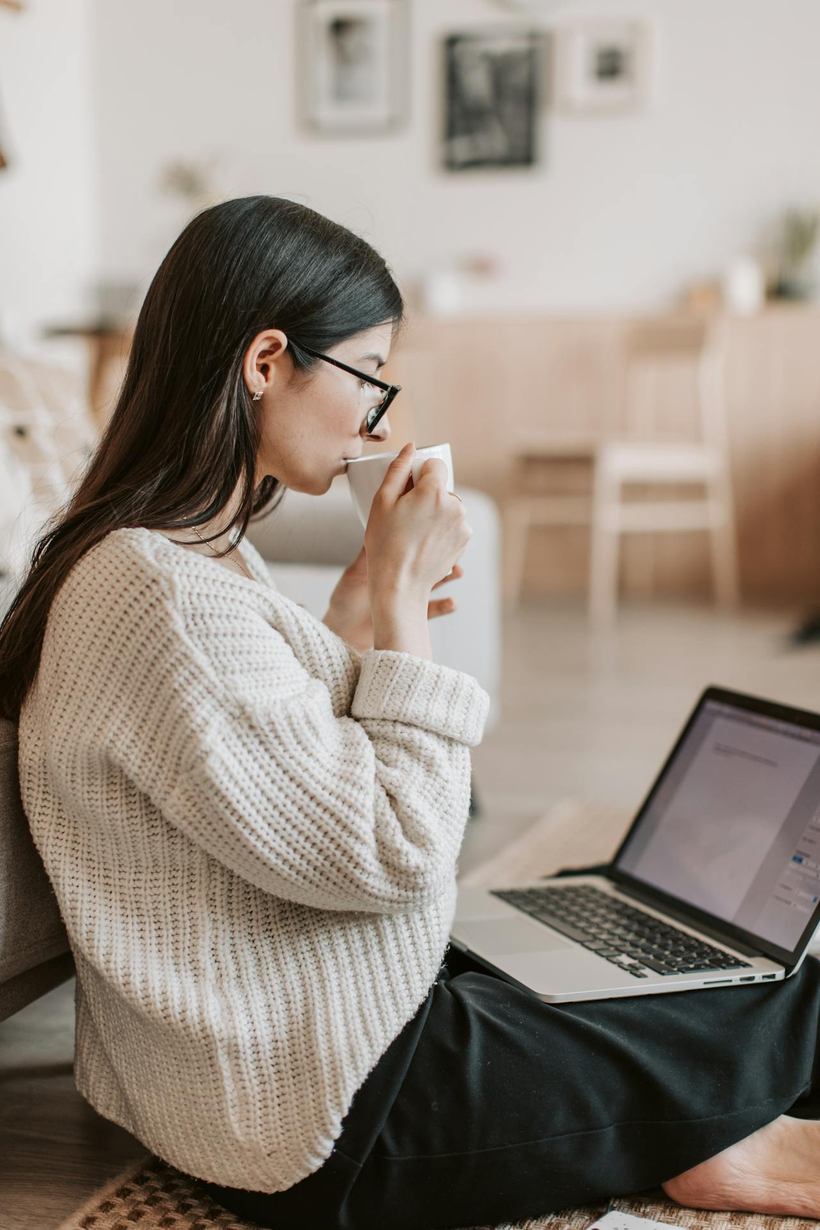 A designer working quietly with a laptop